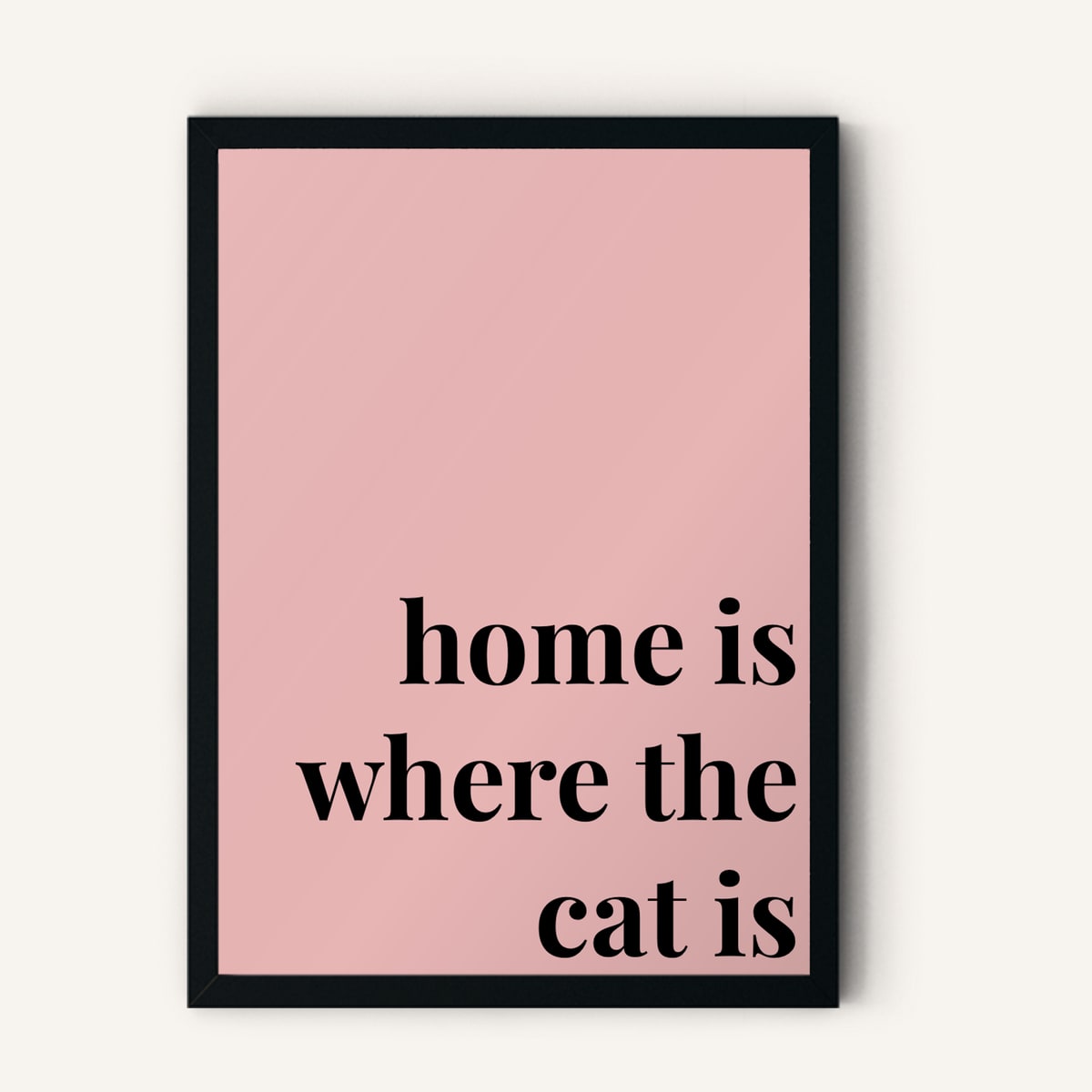 Quote hero: Home Is Where The Cat Is — Blush Pink (#E8B5B5), Black Frame, A-series