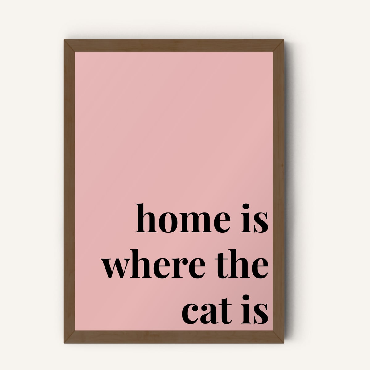 Quote hero: Home Is Where The Cat Is — Blush Pink (#E8B5B5), Dark Wood Frame, A-series