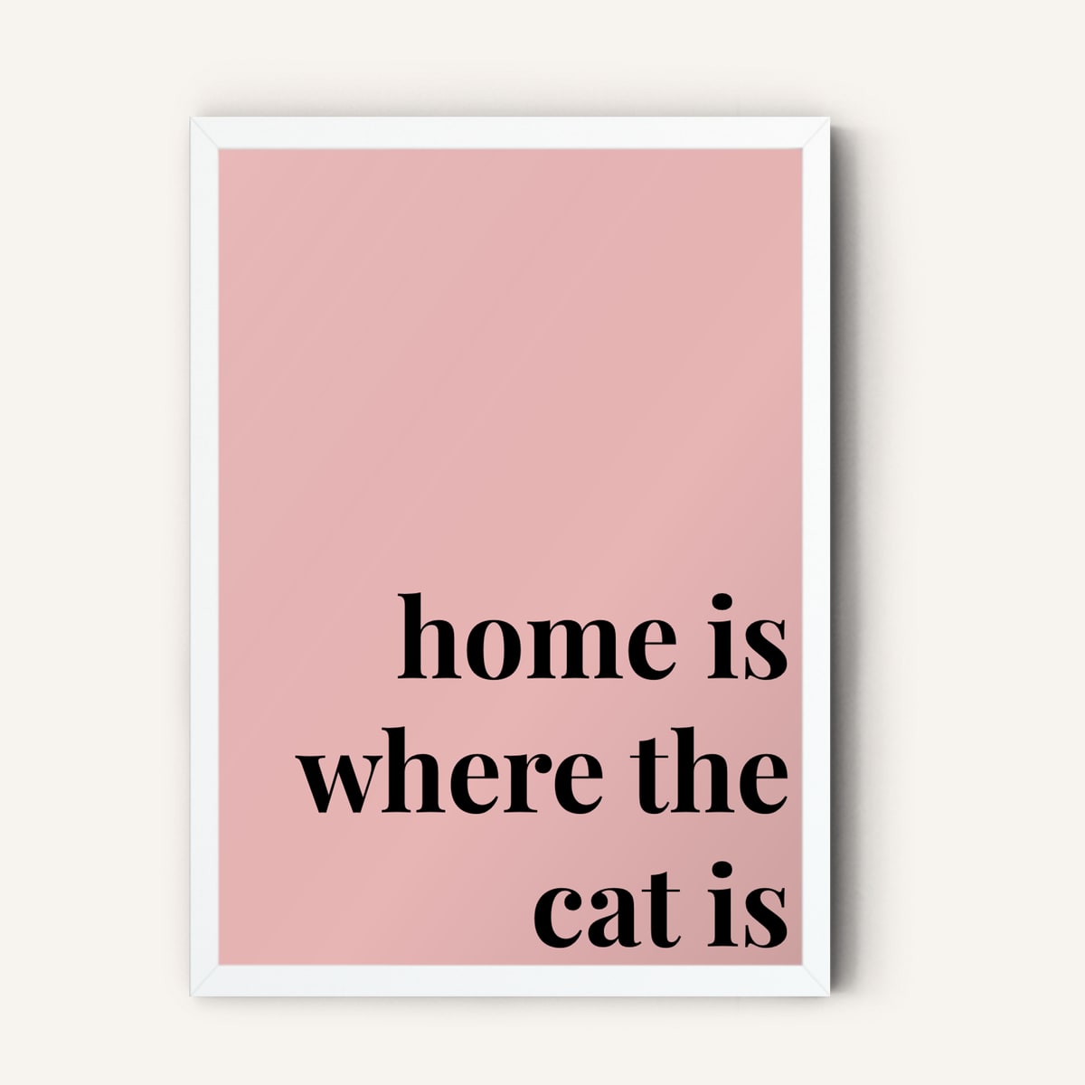Quote hero: Home Is Where The Cat Is — Blush Pink (#E8B5B5), White Frame, A-series