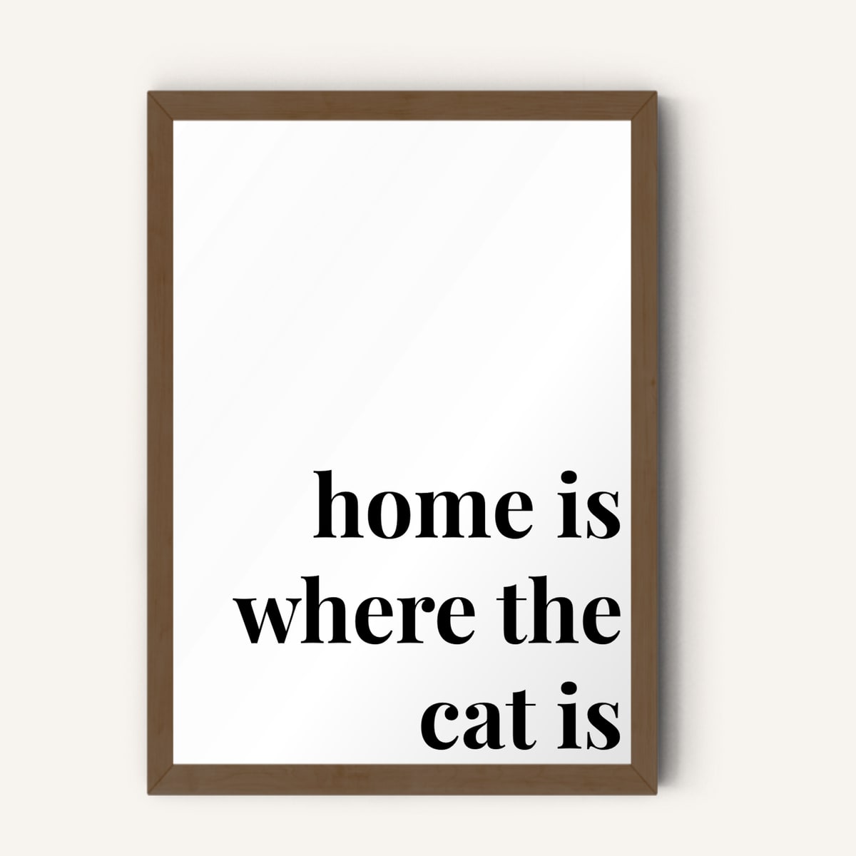 Quote hero: Home Is Where The Cat Is — Classic White (#FFFFFF), Dark Wood Frame, A-series