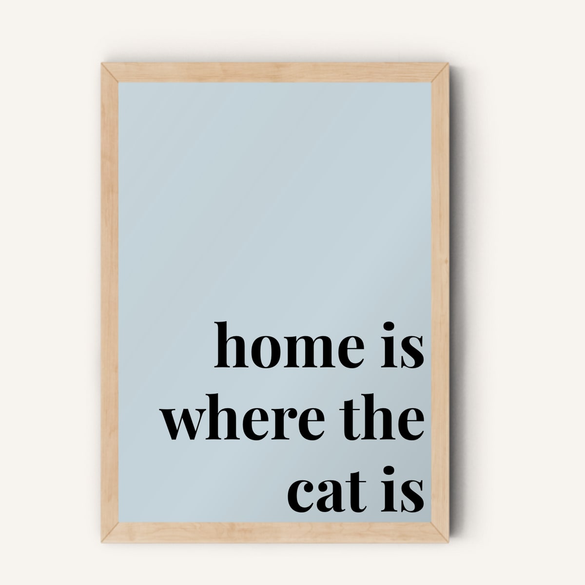 Quote hero: Home Is Where The Cat Is — Duck Egg Blue (#C6D5DB), Natural Wood Frame, A-series