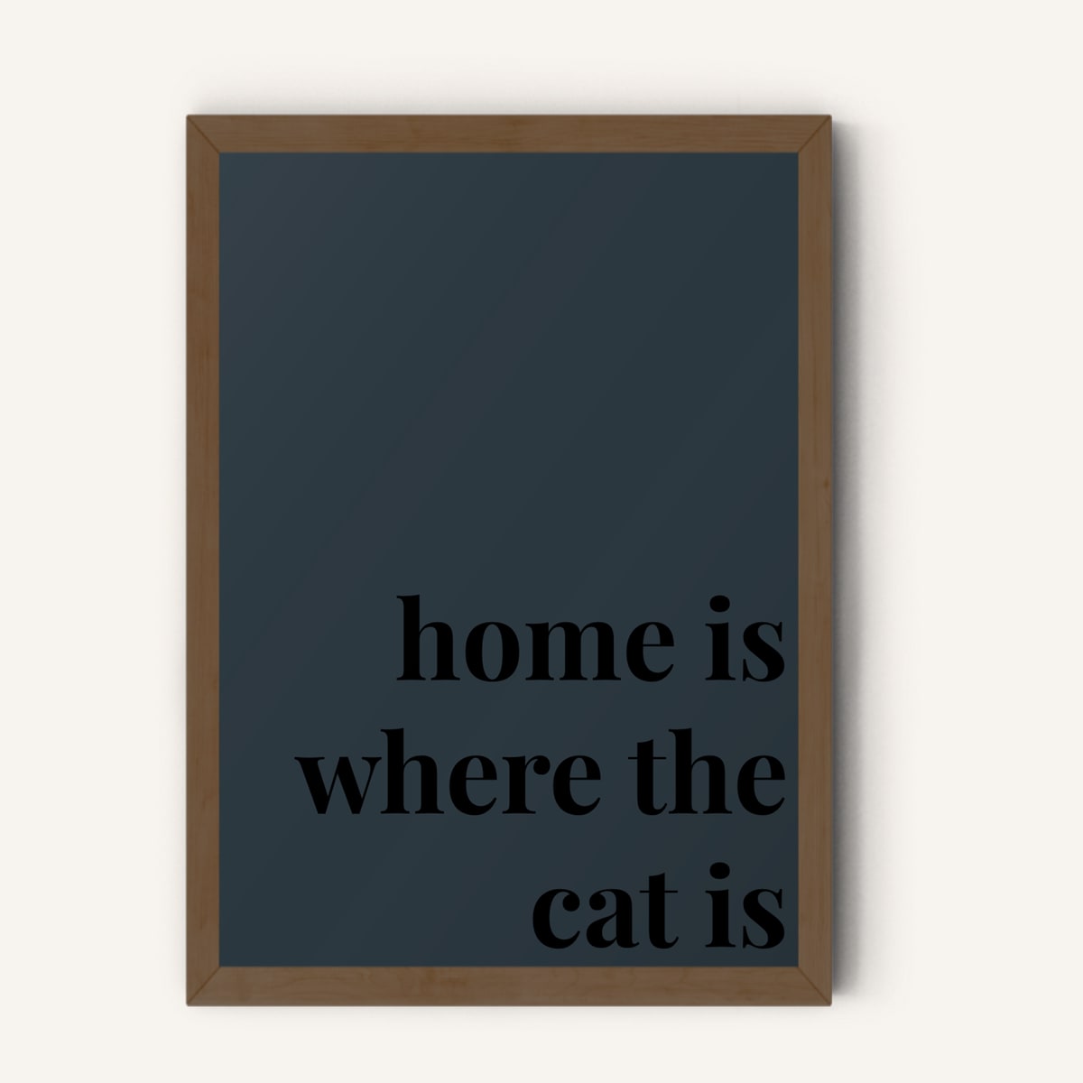 Quote hero: Home Is Where The Cat Is — Navy Grey (#2C3840), Dark Wood Frame, A-series