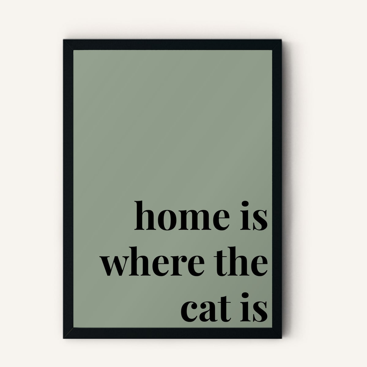 Quote hero: Home Is Where The Cat Is — Sage Green (#919E8B), Black Frame, A-series