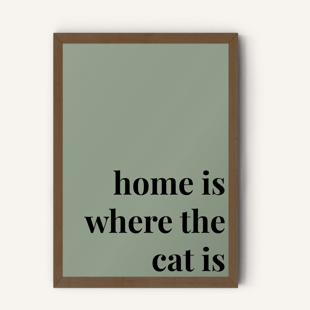 Quote hero: Home Is Where The Cat Is — Sage Green (#919E8B), Dark Wood Frame, A-series