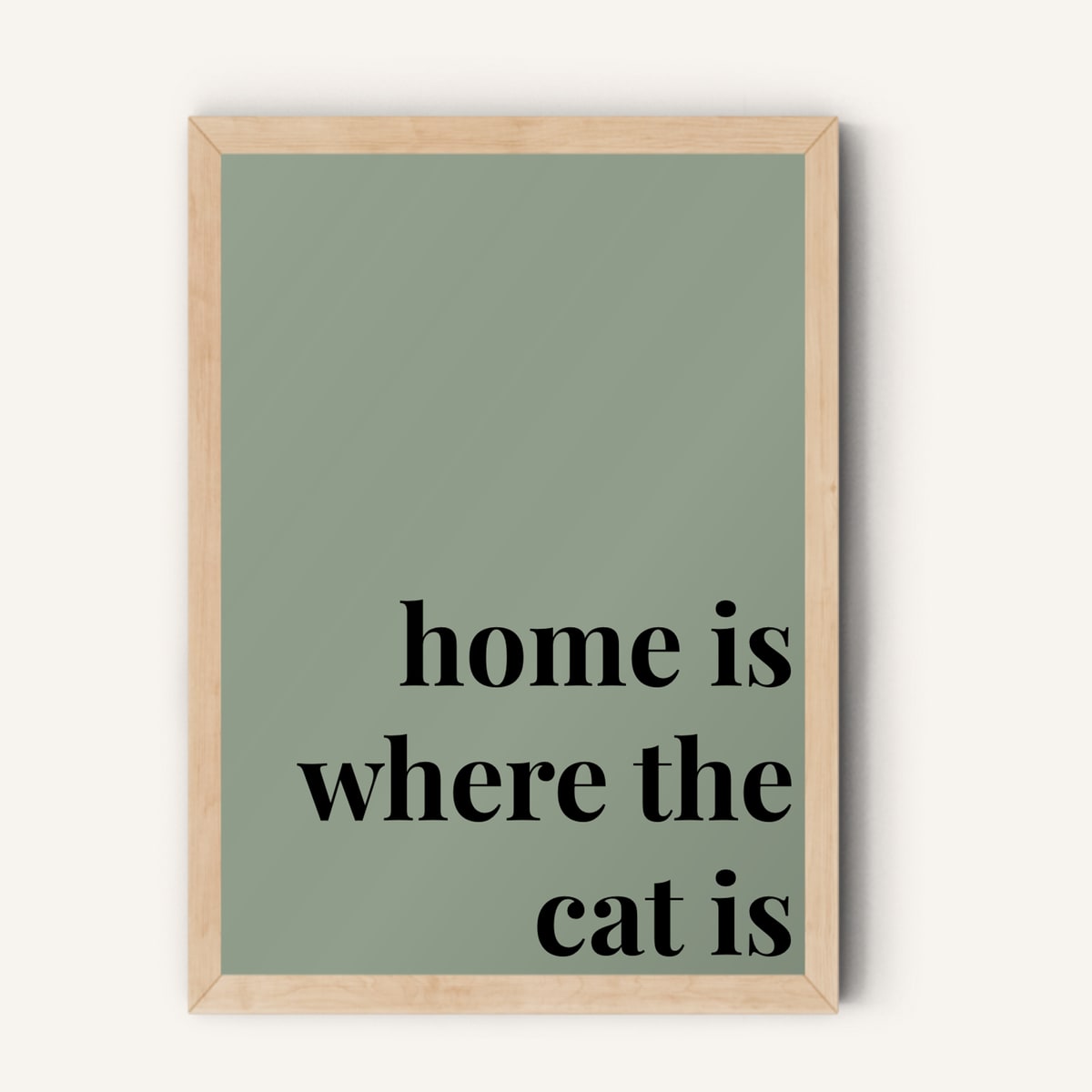 Quote hero: Home Is Where The Cat Is — Sage Green (#919E8B), Natural Wood Frame, A-series
