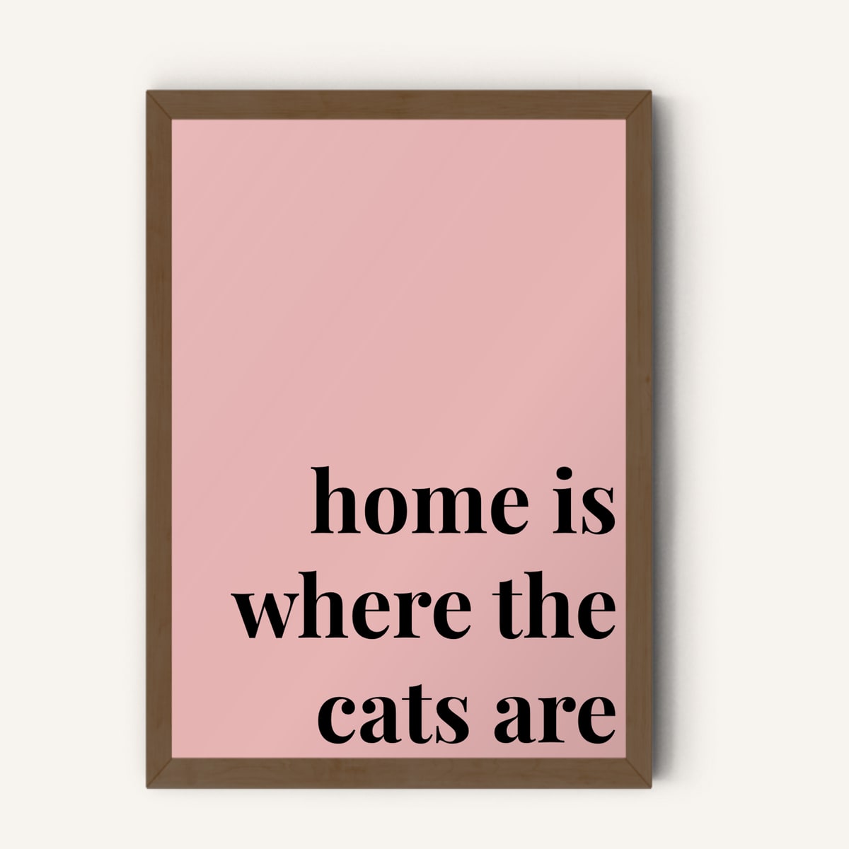 Quote hero: Home Is Where The Cats Are — Blush Pink (#E8B5B5), Dark Wood Frame, A-series