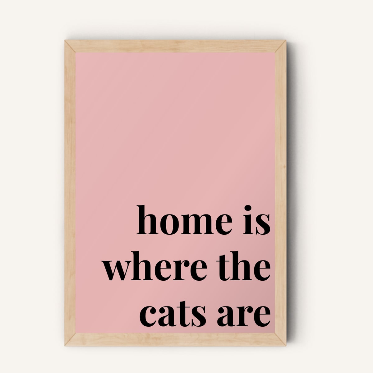 Quote hero: Home Is Where The Cats Are — Blush Pink (#E8B5B5), Natural Wood Frame, A-series