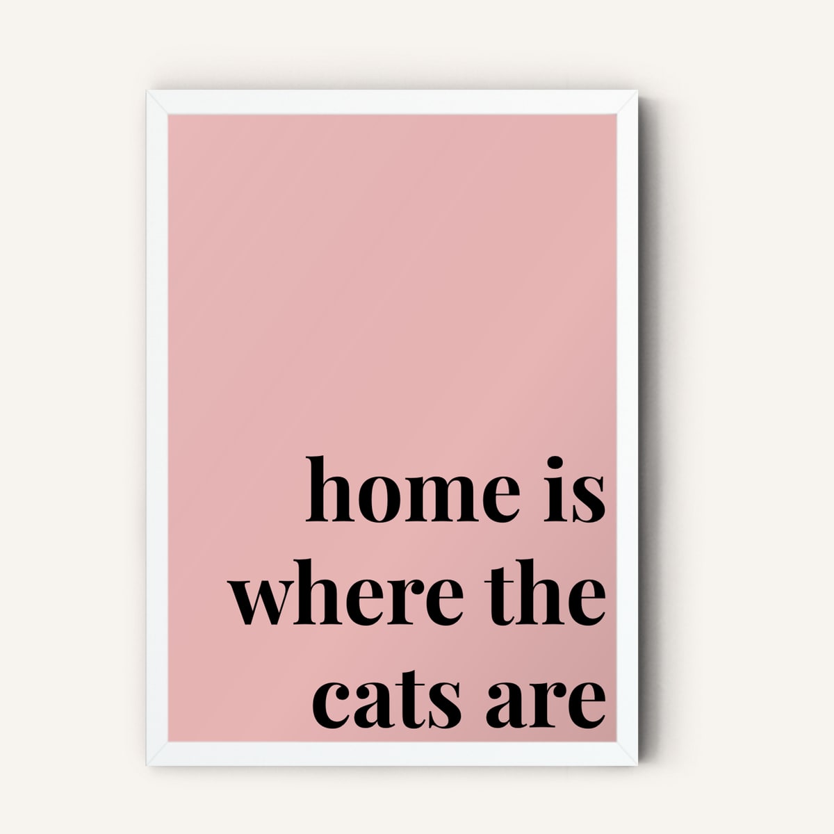 Quote hero: Home Is Where The Cats Are — Blush Pink (#E8B5B5), White Frame, A-series