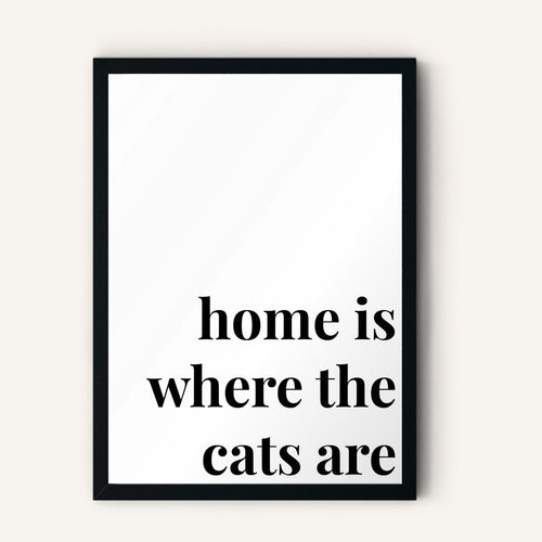 Quote hero: Home Is Where The Cats Are — Classic White (#FFFFFF), Black Frame, A-series