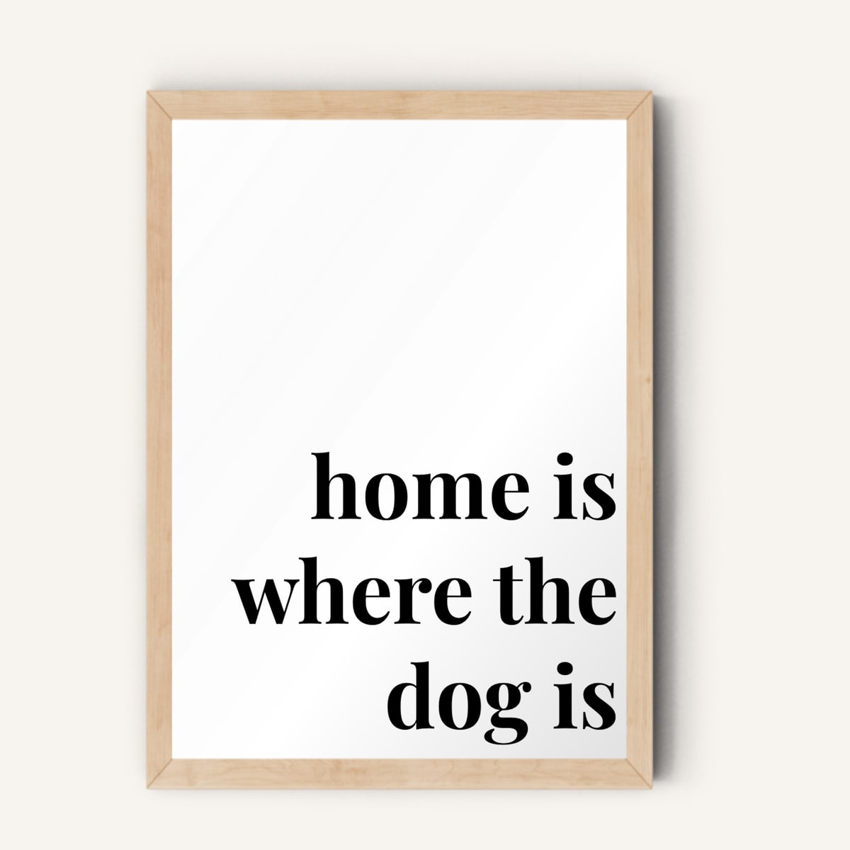 Quote hero: Home Is Where The Dog Is — Classic White (#FFFFFF), Natural Wood Frame, A-series