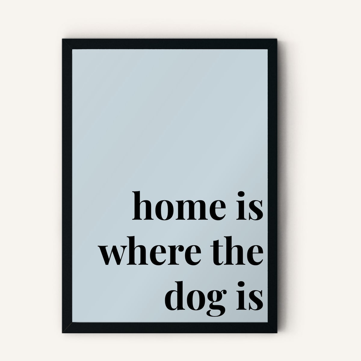 Quote hero: Home Is Where The Dog Is — Duck Egg Blue (#C6D5DB), Black Frame, A-series