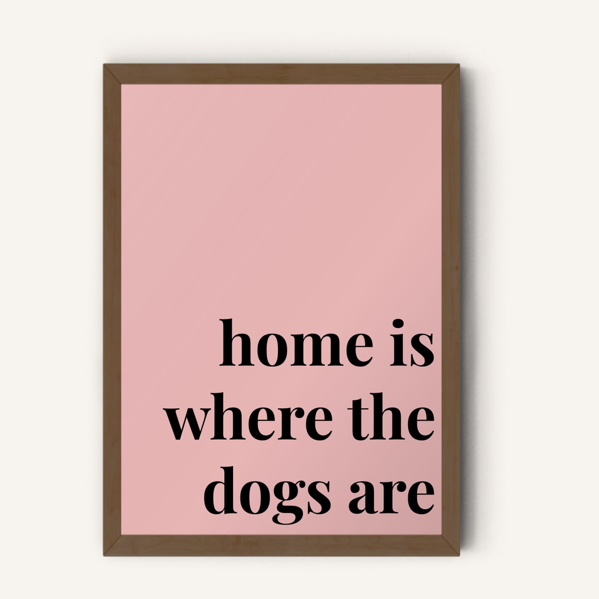 Quote hero: Home Is Where The Dogs Are — Blush Pink (#E8B5B5), Dark Wood Frame, A-series