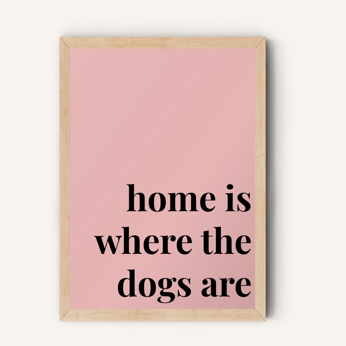 Quote hero: Home Is Where The Dogs Are — Blush Pink (#E8B5B5), Natural Wood Frame, A-series