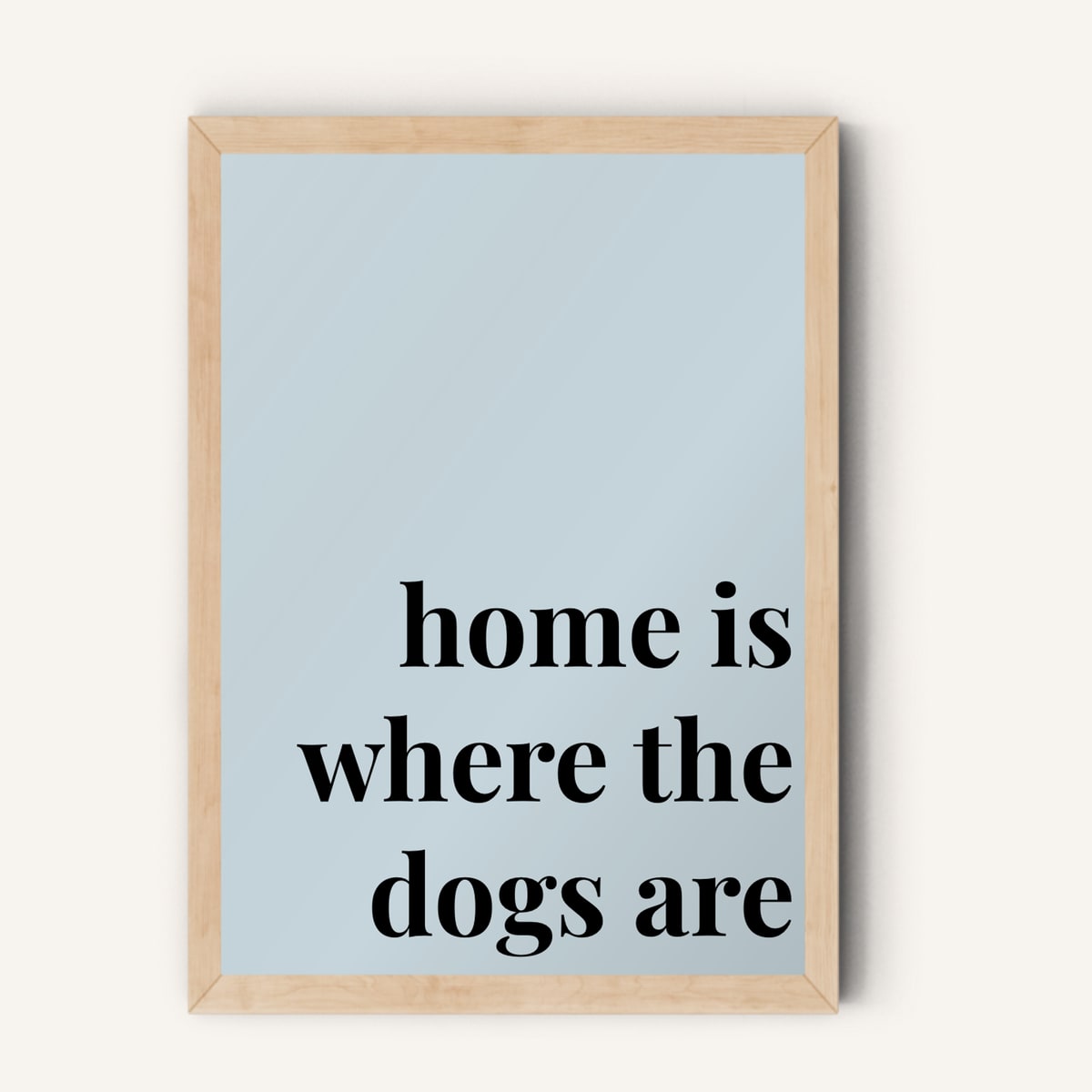 Quote hero: Home Is Where The Dogs Are — Duck Egg Blue (#C6D5DB), Natural Wood Frame, A-series