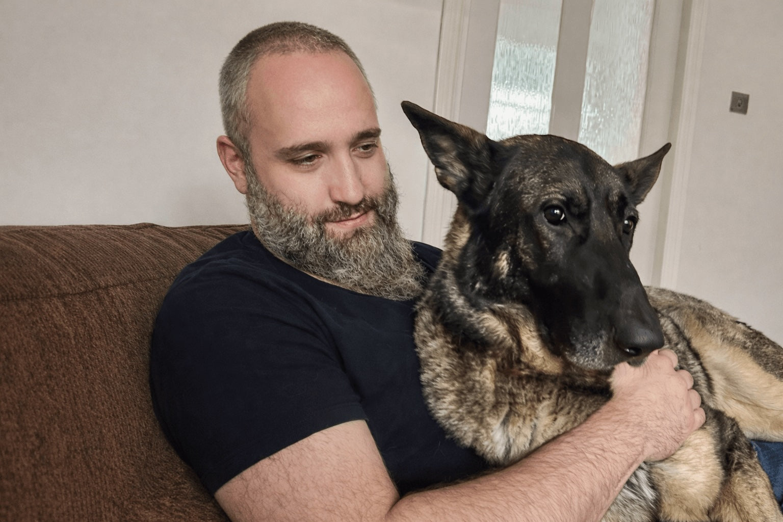 Darryl Bresland with Charlie, his German Shepherd